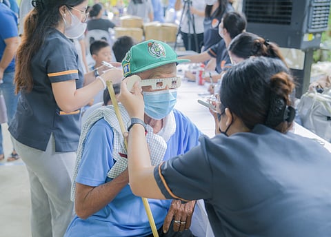 A senior citizen of Barangay Binaliw, Cebu City receives optical assistance during the medical mission organized by the Prime Infra Foundation and Prime Waste Solutions Cebu Inc. on 20 September.