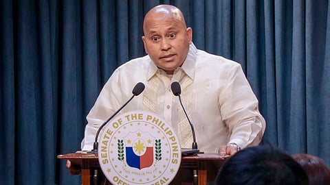 (FILES) SENATOR Ronald dela Rosa gets a mouthful from Rep. Romeo Acop.