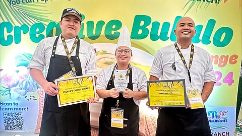 THE winning team: (from left) chef Angelo Joseph Garcia, Arcy Banez and Ernie Baculio.