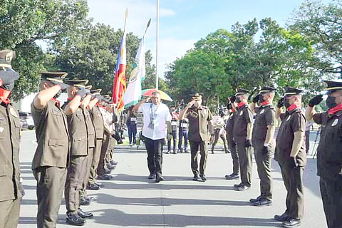 JUSTICE Secretary Jesus Crispin C. Remulla troops the line during the ceremonial release of persons deprived of liberty (PDLs) in a bid to decongest prisons nationwide.