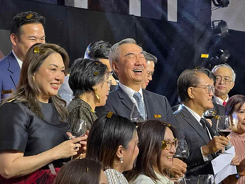 Retail royal Genuine passion for the industry must be behind his success, as SM Prime Holdings Executive Committee chairman Hans Sy shows his delight in a light moment with Trade Undersecretary Jean Pacheco (Sy’s left) after he was hailed the Philippine Retailers Association Presidential Awardee as Retail Development Visionary last Wednesday at Solaire North in Quezon City.