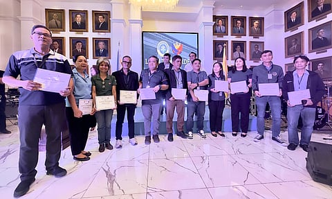 Department of Justice officials led by Undersecretary Frederick Vida honor the loyalty awardees during the culmination of the 127th Founding Anniversary of the agency at the DoJ Main Office in Manila on Thursday. The celebration also highlights the unveiling of the portrait of Severino delas Alas — the first Justice Secretary of the Philippines in 1897.