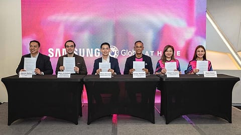 (L-R) Samsung Electronics Philippines Corporation (SEPCO) D2C and B2B Sales Head Jayson Dalino, SEPCO Head of Product Marketing Mahir Al-Rubah, SEPCO Head of AV Chris Almazan, Senior Advisor for Globe's Broadband Business Danny Theseira, Vice President and Head of Brand Management for Globe's Broadband Management Head Abigail Cardino, and Senior Director for Globe's Broadband Channels Partnership Hans Conti officially sign the partnership agreement, marking a new chapter of collaboration between Globe At Home and Samsung.