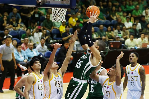 Michael Phillips bangs in 12 points and hauled down 18 rebounds to power La Salle to an 88-67 win over UST in their UAAP Season 87 basketball game on Sunday at the Smart Araneta Coliseum.