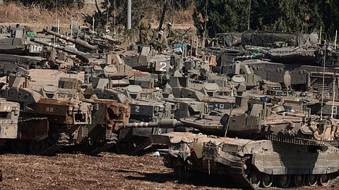 Israeli army tanks are deployed in the Upper Galilee region of northern Israel near the border with Lebanon on 29 September 2024. Israel said on 29 September that it was carrying out new air raids against "dozens" of Hezbollah targets in Lebanon, after killing the Iran-backed group's leader, Hassan Nasrallah. Israel has also raised the prospect of a ground operation against Hezbollah, prompting widespread international concern.