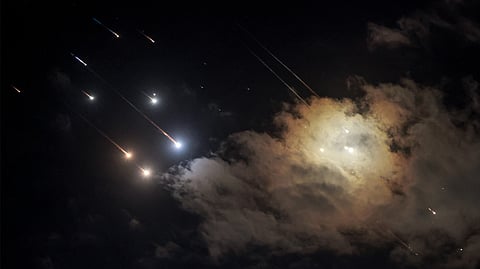 This picture shows projectiles being intercepted by Israel above Jerusalem on 1 October 2024. Air raid sirens sounded in central Israel on 1 October, the military said, a day after the army launched ground operations into southern Lebanon targeting Hezbollah positions. "Sirens sounded in central Israel," the military said, without providing details of the areas that were affected.