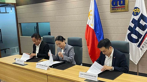 (From left to right) Small Business Corporation president Bobby Bastillo, Trade Acting Secretary Christina Roque, and Sam Christopher Lim, chairperson of the PFA signed the MoU on Tuesday at the DTI office in Makati City.