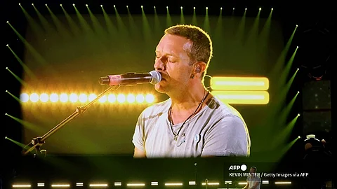 (FILES) Chris Martin of Coldplay performs onstage at the 2024 iHeartRadio Music Festival at T-Mobile Arena on 21 September 2024 in Las Vegas, Nevada.