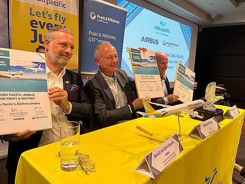 (L-R) Airbus Executive Vice President for Sales Benoit de Saint-Exupery, Cebu Pacific CEO Michael Szucs, and Pratt & Whitney President for Commercial Engines Rick Deurloo at the signing of the P1.4-trillion deal.