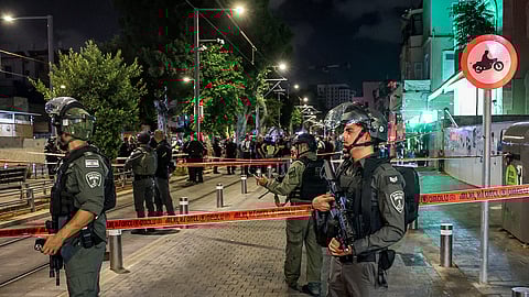 Israeli border guards deploy at the scene of a shooting attack outside al-Nuzha mosque along Jerusalem Boulevard in Jaffa south of Tel Aviv, Israel on Oct. 1, 2024.