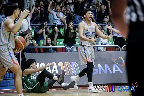 ava Vinoya celebrates after helping Arellano University register a stunning 73-71 win over College of Saint Benilde in Season 100 NCAA men’s basketball tournament.