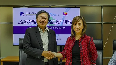 Philguarantee president and chief executive officer Alberto Pascual and Water.org regional director for Southeast Asia Griselda Santos signed their memorandum of understanding on financing to rural banks to help small and medium enterprises provide clean water to underserved communities.