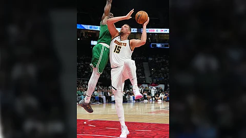 NIKOLA Jokic of the Denver Nuggets makes a good impression despite suffering a 107-103 loss to the Boston Celtics in an NBA pre-season game in Abu Dhabi.
