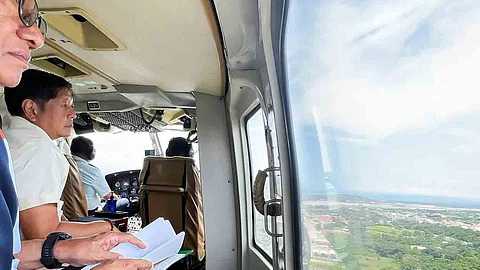 President Ferdinand Marcos Jr. tours Ilocos Norte in an aircraft in the aftermath of a recent typhoon as he pursues effective solutions to disaster-affected regions.