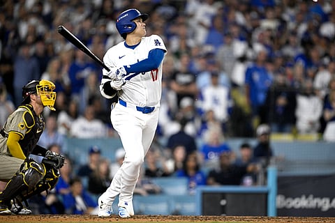 SHOHEI Ohtani blasts a three-run home run to power the Los Angeles Dodgers to a 7-5 win over the San Diego Padres in the opener of their MLB playoffs series.
