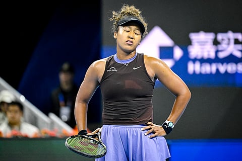 Naomi Osaka is being hobbled by injury, prompting her to pull out of the Japan Open.