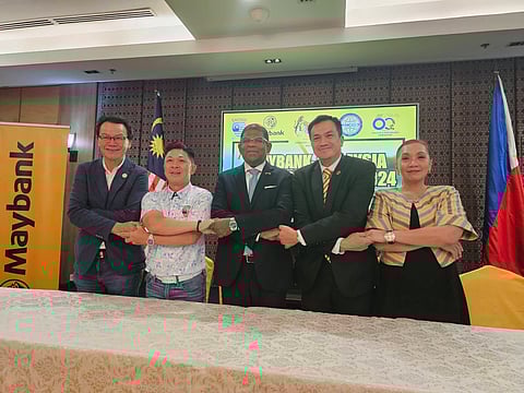Joined hands for this year’s cc are (from left) Malaysian Chamber of Commerce and Industry chairman Edward Ling, MCCI deputy chairman Stephen Khan, Malaysian Ambassador Dato Abdul Malik Melvin Castelino, Maybank Philippines CEO Patrick Dennis Solosa and Maybank corporate affairs head Edelyn Castro.