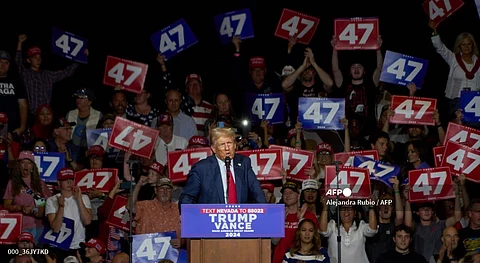 Former US President and Republican presidential candidate Donald Trump speaks during a campaign rally at Grand Sierra Resort in Reno, Nevada on 11 October 2024.