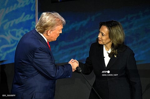US Vice President and Democratic presidential candidate Kamala Harris (R) shakes hands with former US President and Republican presidential candidate Donald Trump during a presidential debate at the National Constitution Center in Philadelphia, Pennsylvania, on 10 September 2024.
Kamala Harris and Donald Trump are entering the final one-month sprint to the most dramatic US presidential election in modern history, with both candidates warning the fate of a divided nation hangs on a result that is still too close to call.
SAUL LOEB / AFP