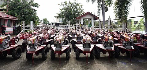 Dozens of hand tractors are shown during the handover ceremony of agricultural machinery in Bacnotan, La Union.