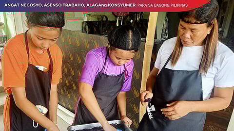 Members of the Magao Ortilano Modernong Magsasakang Association (left) of Concepcion, Tarlac and Farmer Cooperatives and Associations of Tarlac make jam and puto-kutsinta out of camote under a food processing training of DTI.