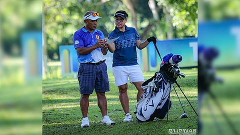 SARAH Ababa (right) and his father, Edgar, face a tough challenge when they vie in the ICTSI Bacolod Golf Challenge at the Bacolod Golf and Country Club on Tuesday.