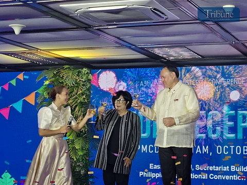 Defense Sec. Gilbert Teodoro, along with DENR Sec. Maria Antonia Yulo-Loyzaga and PCO Senior Undersecretary for Digital Media Services Emerald Ridao, leads the toast to mark the start of the Asia-Pacific Ministerial Conference on Disaster Risk Reduction 2024, hosted by the Philippines from 14-18 October 2024.