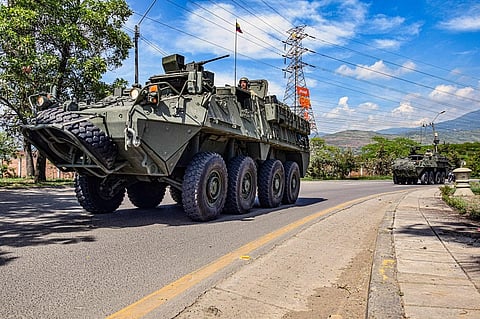 Colombian soldiers patrolling the streets on Oct 14 as part of the security plan for the COP16 conference in Cali.