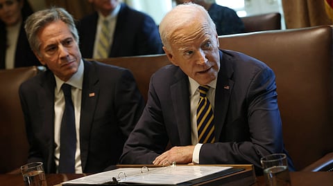 US President Joe Biden, with Secretary of State Antony Blinken (L).