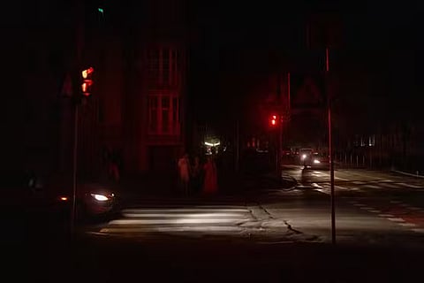 An unlit street during a partial power outage, following Russian strikes on electric infrastructure in Ukraine, in Kyiv, on August 28, 2024.
