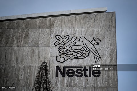 Nestle lowered its outlook again for 2024 and reshuffled its executive team on Thursday as the global food giant reported falling sales for the first nine months of the year.