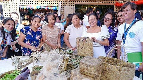 FIRST Lady Liza Araneta-Marcos explores different cuisines and products of Sorsogon province during the Kasanggahan Festival. She also met with the people behind the products of the province.