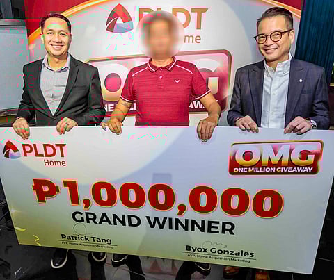 PLDT Home’s Vice President for Home Product and Portfolio Management Roy Victor E. Añonuevo and First Vice President of Acquisition Marketing Patrick S. Tang with the One Million Giveaway (OMG) Promo grand prize winner.