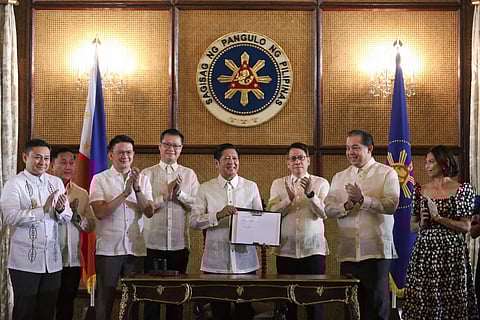 resident Ferdinand R. Marcos Jr. signs the Academic Recovery and Accessible Learning Program Act or ARAL Law in a ceremony at Malacañan Palace on Friday, October 18, 2024. Standing as witness are Senate President Francis Escudero, House Speaker Martin Romualdez, Department of Education Secretary Sonny Angara, Senator Aherwin Gatchalian, Senate Majority Leader Senator Francis Tolentino, Pasig City Lone District Representative Roman Romulo, Marikina City 2nd District Representative Stella Quimbo, and other government officials.