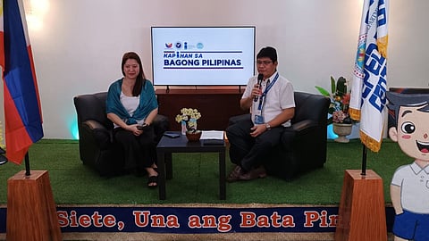 DepEd-VII Regional Director Dr. Salustiano Jimenez (R) discusses the issue of teachers leaving for overseas jobs during the Kapihan sa Bagong Pilipinas media forum, hosted by PIA-VII Regional Director Fayette Rinen (L).