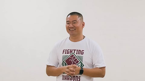 Benson Bocboc takes over the coaching reins of the UP women's volleyball team.