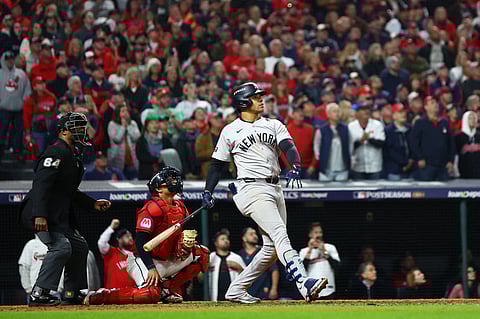 Juan Soto hits a homer to help New York down Cleveland, 5-2, and reach its 41st World Series overall.