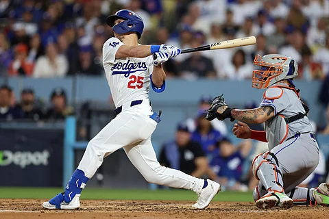 TOMMY Edman blasts a two-run home run that lifted the Los Angeles Dodgers to a 10-5 win over the New York Mets to seal their entry to the World Series.