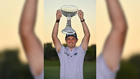 J.T. Poston lifts the third PGA Tour trophy of his career after emerging victorious in the Shriners Children’s Open 2024 in Las Vegas, Nevada.