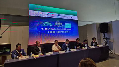 Public officials and private sector leaders hold a press conference to provide updates on the collaborative push for wider adoption of electric vehicles in the Philippines.