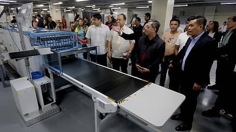 Ink, paper and machines. Commission on Elections Chairman George Garcia is joined by National Printing Office Director Arjay Lim, Comelec Commissioners Ernesto Maceda Jr. and Rey Bulay, as well as Miru Inc. vice president Cho Song Rea at the NPO for the ceremonial turnover of printing machines and test ballots to be used for next year’s elections.