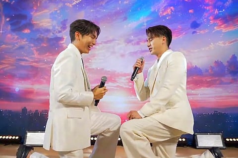 Thai actors Mew Suppasit and Tul Pakorn.
