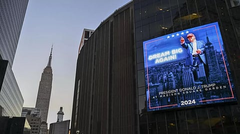 An illuminated sign announcing the arrival of Donald Trump at Madison Square Garden, October 27, 2024, in New York.