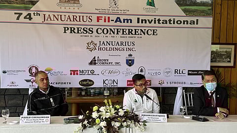 JUDE Eustaquio (middle) and Anthony de Leon (right) launch the 74th edition of the Fil-Am Invitational golf tournament on Monday at the Baguio Country Club. Also shown is Paolo Cagalingan of title sponsor Januarius Holdings Inc.