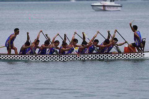 The national junior dragon boat team competes in the 2,000-meter small boat event during the ICF Dragon Boat World Championships on Thursday in Puerto Princesa City.