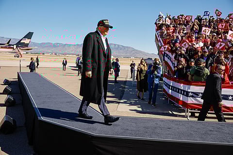 Republican presidential nominee, former United States President Donald Trump, arrives to a campaign rally at Albuquerque International Sunport in Albuquerque, New Mexico. With less than a week until Election Day, Trump is campaigning for re-election in New Mexico and the battleground states of Nevada and Arizona on Thursday.