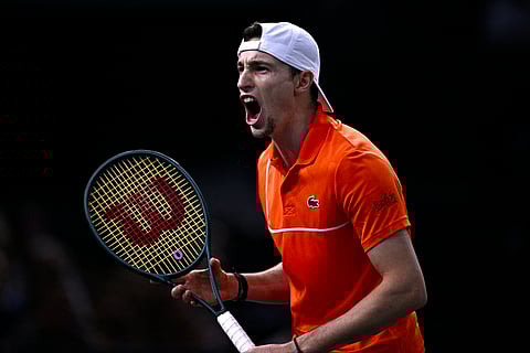Ugo Humbert celebrates after stunning Carlos Alcaraz in the third round of the Paris Masters.