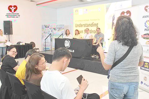 Participant asks experts during the ‘Understanding Down Syndrome: A Sensitivity Seminar.’