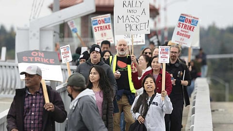 Striking workers with the International Association of Machinists and Aerospace Workers will weigh Boeing's latest offer after voting down two previous contracts.