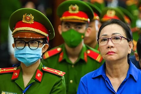 Vietnamese property tycoon Truong My Lan (R) looks on at a court in Ho Chi Minh City on November 4, 2024. The appeal of a Vietnamese property tycoon given the death penalty for fraud totalling $27 billion will begin on Monday, November 4, after she pleaded for a more "lenient and humane" sentence.